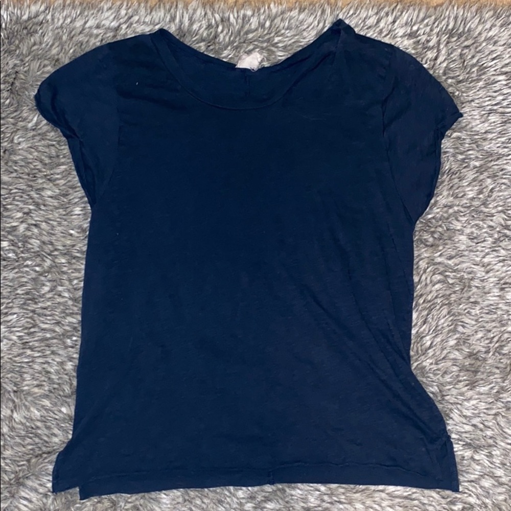 Women’s casual top with ripped collar detail